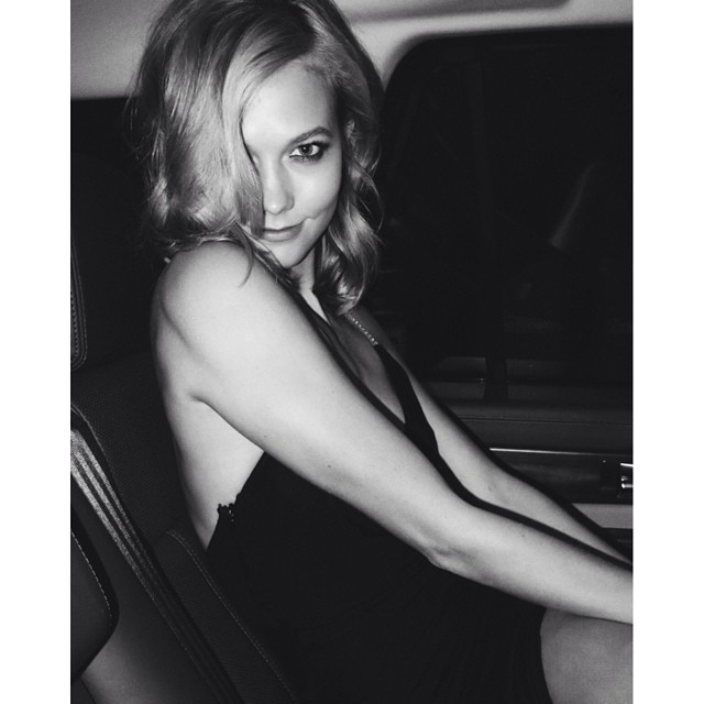 Karlie Kloss in car during couture fashion week by Mario Testino