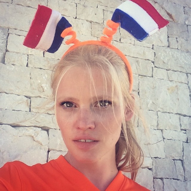 Lara Stone roots for Holland during World Cup