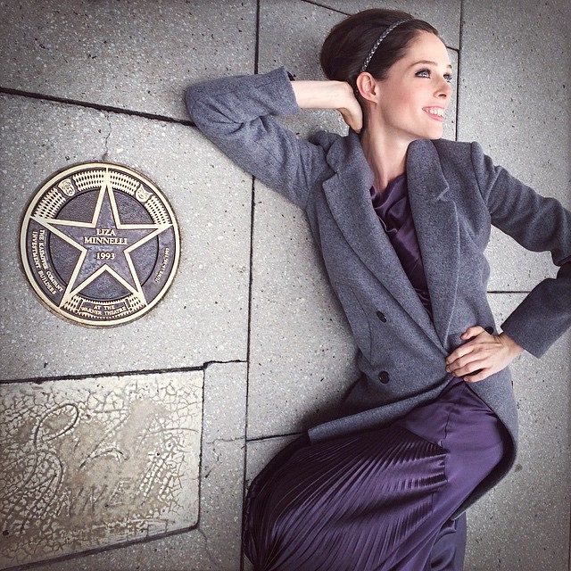 Coco Rocha poses next to Liza Minelli's star on Hollywood Walk of Fame