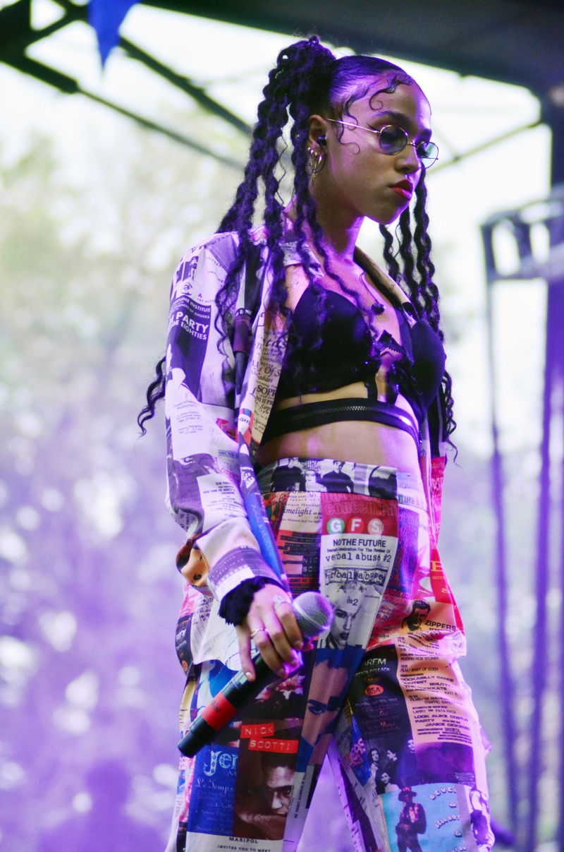 In concert at the 2014 Pitchfork Music Festival, FKA Twigs wears a bralette with high-waist trousers and a matching jacket. Photo: Daniel Locke / PR Photos 