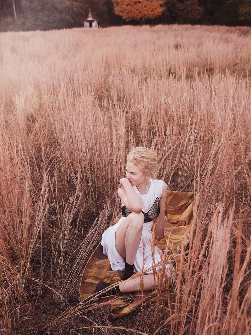 Lounging on a blanket, Nicole Kidman poses in Celine dress and Falke socks