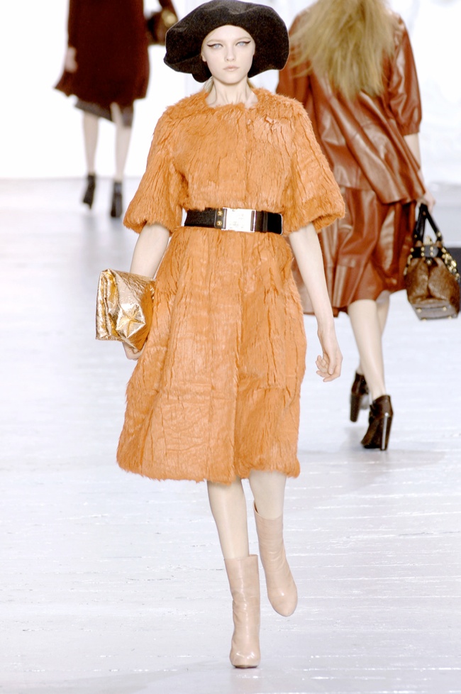 A model displays a creation by US designer Marc Jacobs for Louis Vuitton  Fall-Winter 2008-2009 Ready-to-Wear collection presentation held at La Cour  Carre du Louvre in Paris, France, on March 2, 2008.