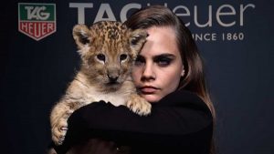 Cara Delevingne Stars in New TAG Heuer Ads & Poses with a Lion Cub ...