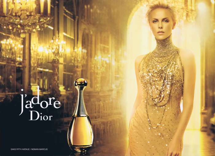 The advertisements often feature the actress dipped in gold. Photo: J'adore Dior campaign from 2012 with Charlize Theron. 