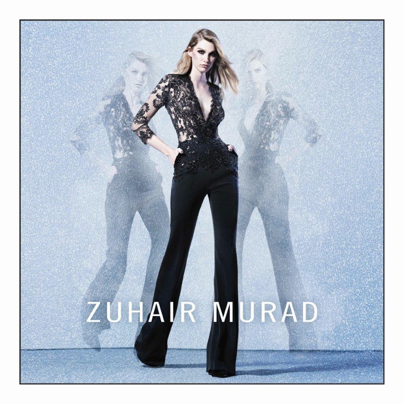 The model wears Zuhair Murad's signature embellishments in a black jumpsuit