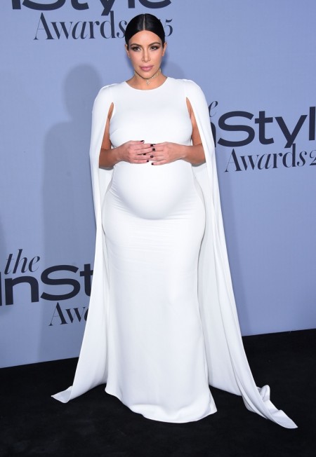 Kim Kardashian Shows Off Maternity Style in Caped Valentino Dress ...