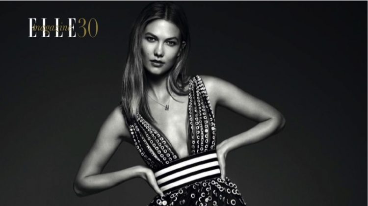 Model Karlie Kloss wears semi-transparent Carolina de Herrera dress and CH Carolina Herrera jewelry