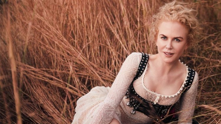 Actress Nicole Kidman poses in Alexander McQueen dress and Stetson boots