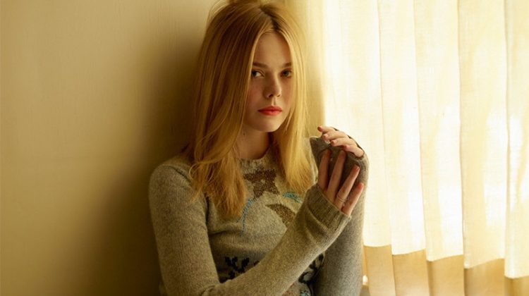 Actress Elle Fanning wears Dior sweater and tulle skirt
