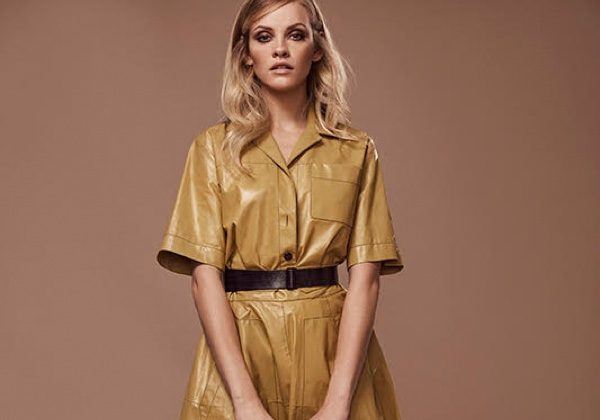 Ginta Lapina poses in shirt dress with utilitarian accents
