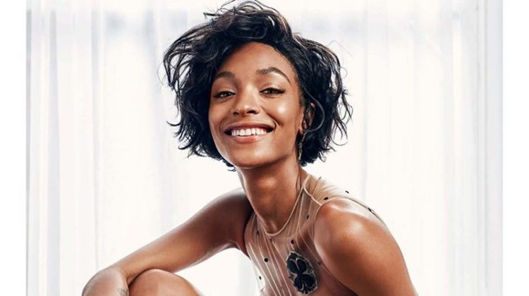 All smiles, Jourdan Dunn poses in Dior dress, briefs and boots