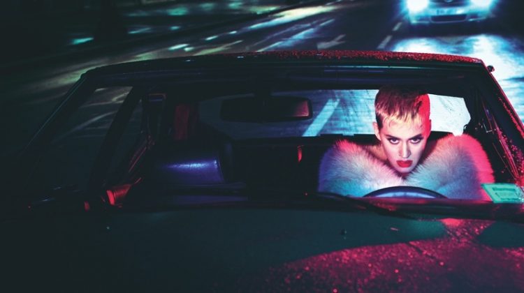 Posing in a car, Katy Perry wears Miu Miu stole