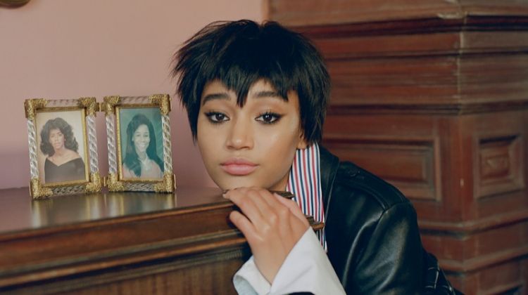 Amandla Stenberg poses in jacket and shirt from Louis Vuitton