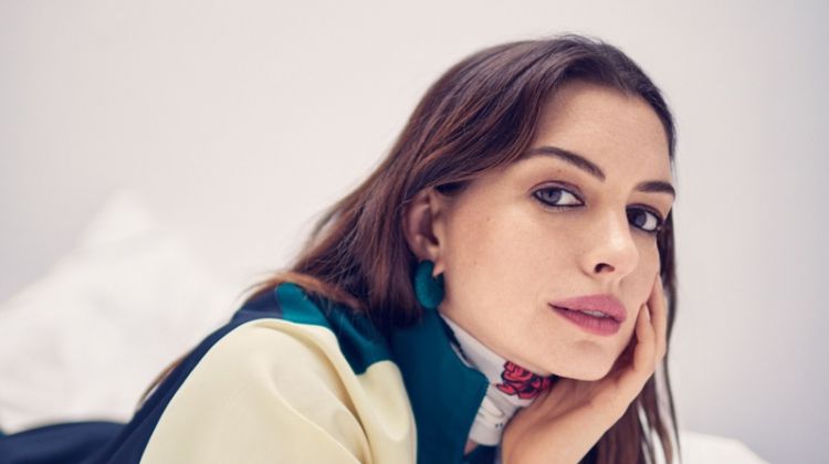 Actress Anne Hathaway poses in Lacoste dress, Rockins scarf and Celine earring