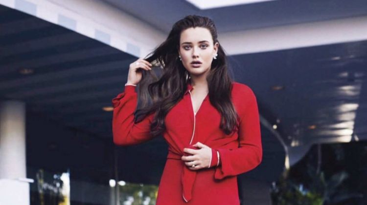 A lady in red, Katherine Langford wears Salvatore Ferragamo blouse, skirt and sandals