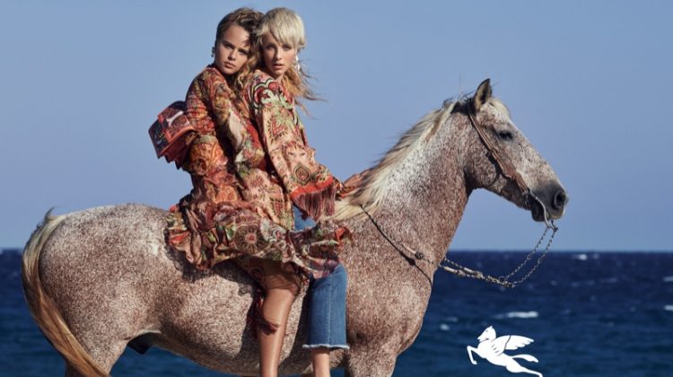 Edie Campbell and Olivia Vinten pose on a horse for Etro spring-summer 2019 campaign