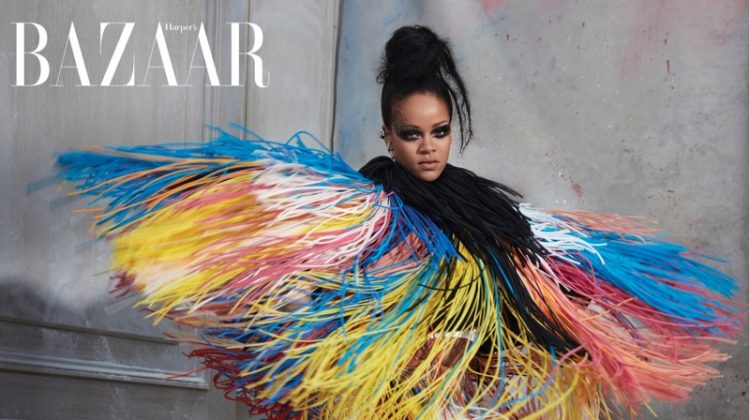 Striking a pose, Rihanna wears Givenchy Haute Couture fringed jacket, dress and shoes