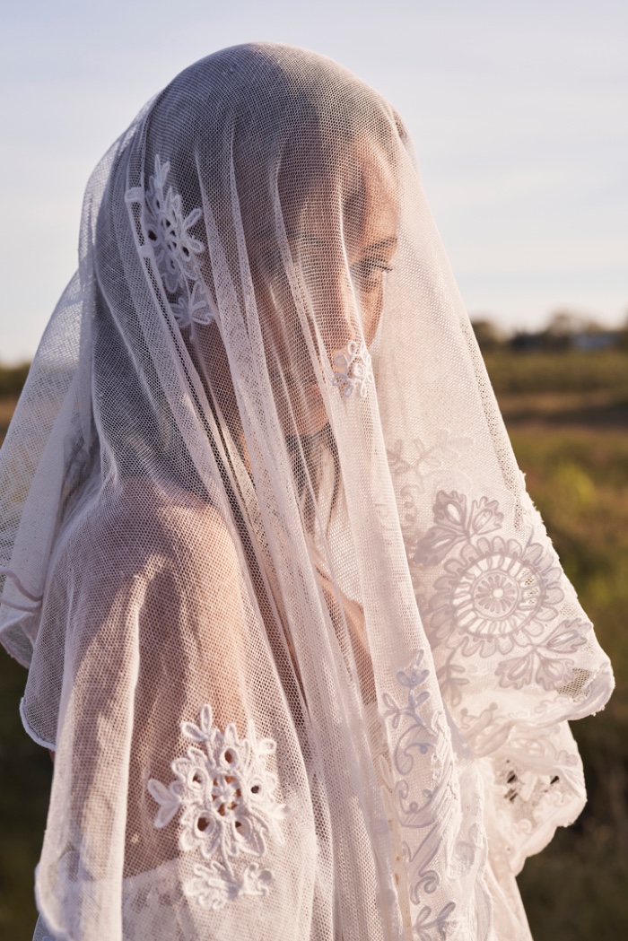 Chantal Monaghan models veil design in LoveShackFancy Bridal summer 2020 campaign.