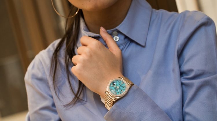 Cropped Woman Wearing Rolex Watch Gold