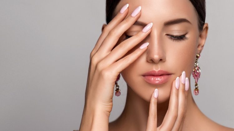 Beauty Model Manicured Nails Earrings Hands