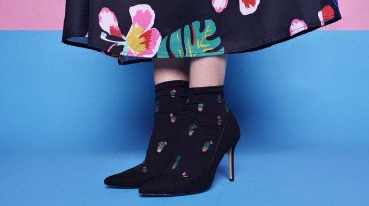 Closeup Woman Printed Socks Black Heels