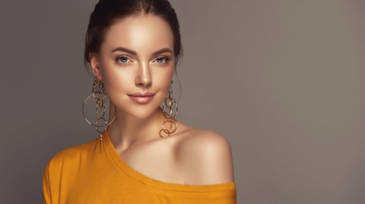 Model Gold Layered Hoop Earrings One Shoulder Top