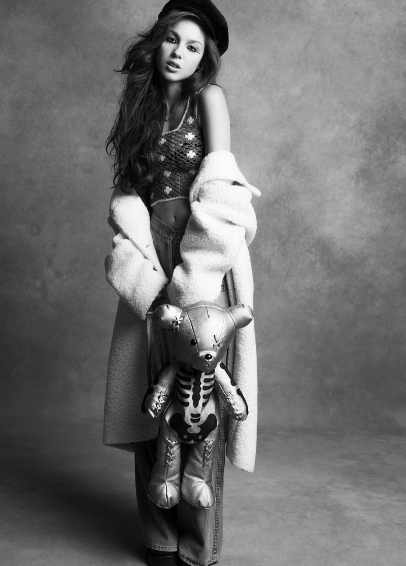 Singer Olivia Rodrigo wears Prada coat, Guess Vintage pants, and Tiffany & Co. Necklace. Image: Courtesy of V Magazine / Inez & Vinoodh