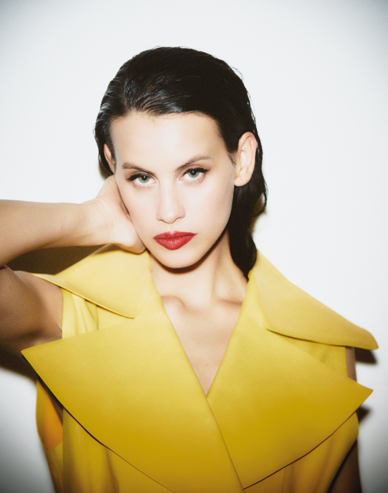 Actress Milenia Smit poses in yellow Loewe vest. Photo: Javier Biosca / InStyle Spain