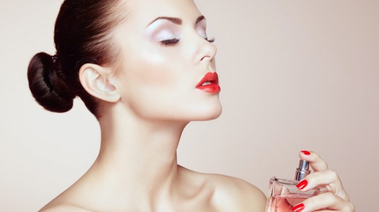 Model Bun Eyeshadow Red Lips Nails Fragrance Bottle Beauty