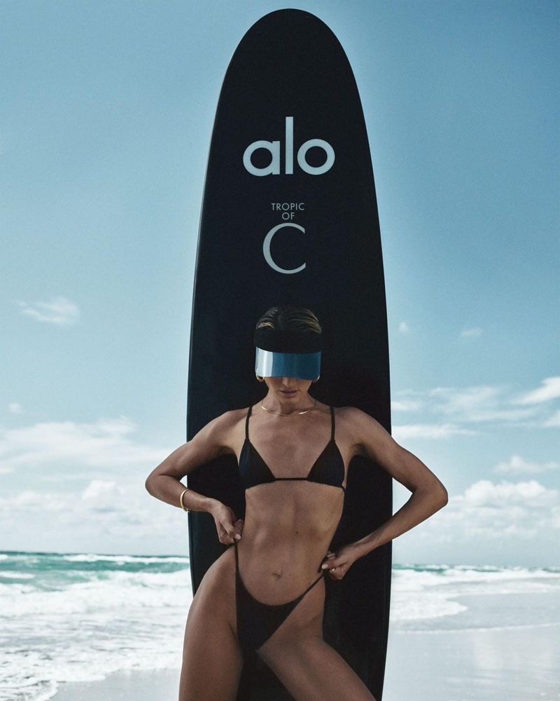 https://www.fashiongonerogue.com/wp-content/uploads/2022/06/Candice-Swanepoel-Alo-Tropic-C-Swim-Campaign05.jpg