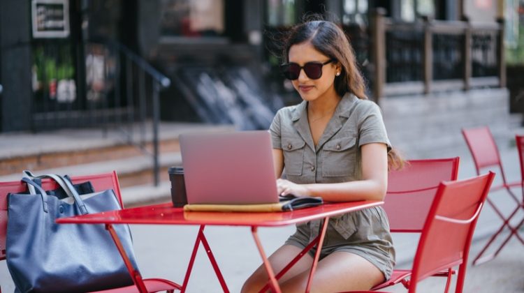 Woman Laptop Outside Stylish Table