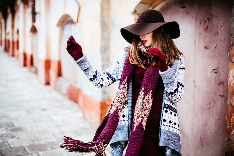 https://www.fashiongonerogue.com/wp-content/uploads/2022/12/Woman-Colorful-Scarf-Winter-Knit-Jacket.jpg