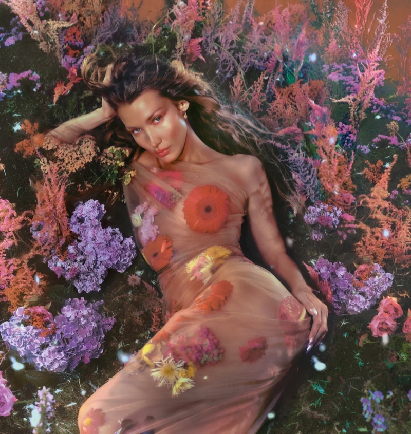 Draped in flowers, Bella Hadid stuns in an ad for Orebella perfume.