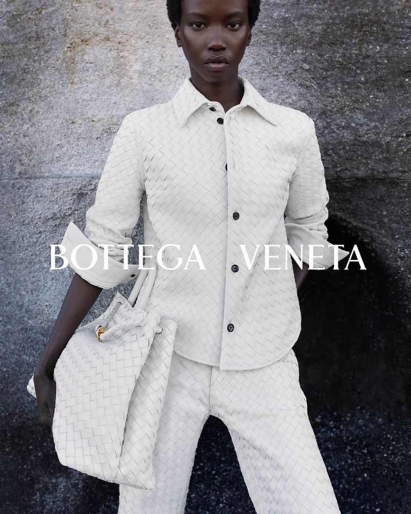 Embrace sophistication with Bottega Veneta's Summer Solstice 2024 collection featuring a textured white ensemble.