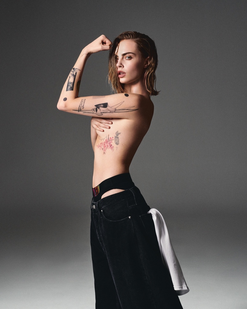 Posing topless, Cara Delevingne rocks Calvin Klein jeans and underwear in new Pride campaign.