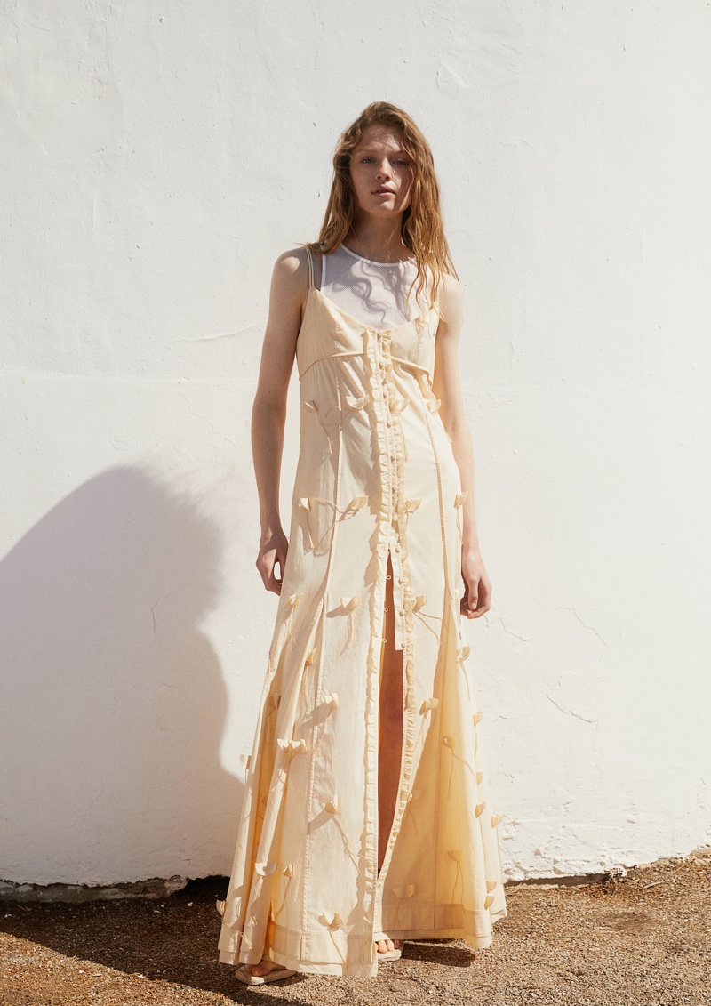 Effortlessly stylish, H&M Studio's yellow maxi dress shines in the summer 2024 capsule collection.
