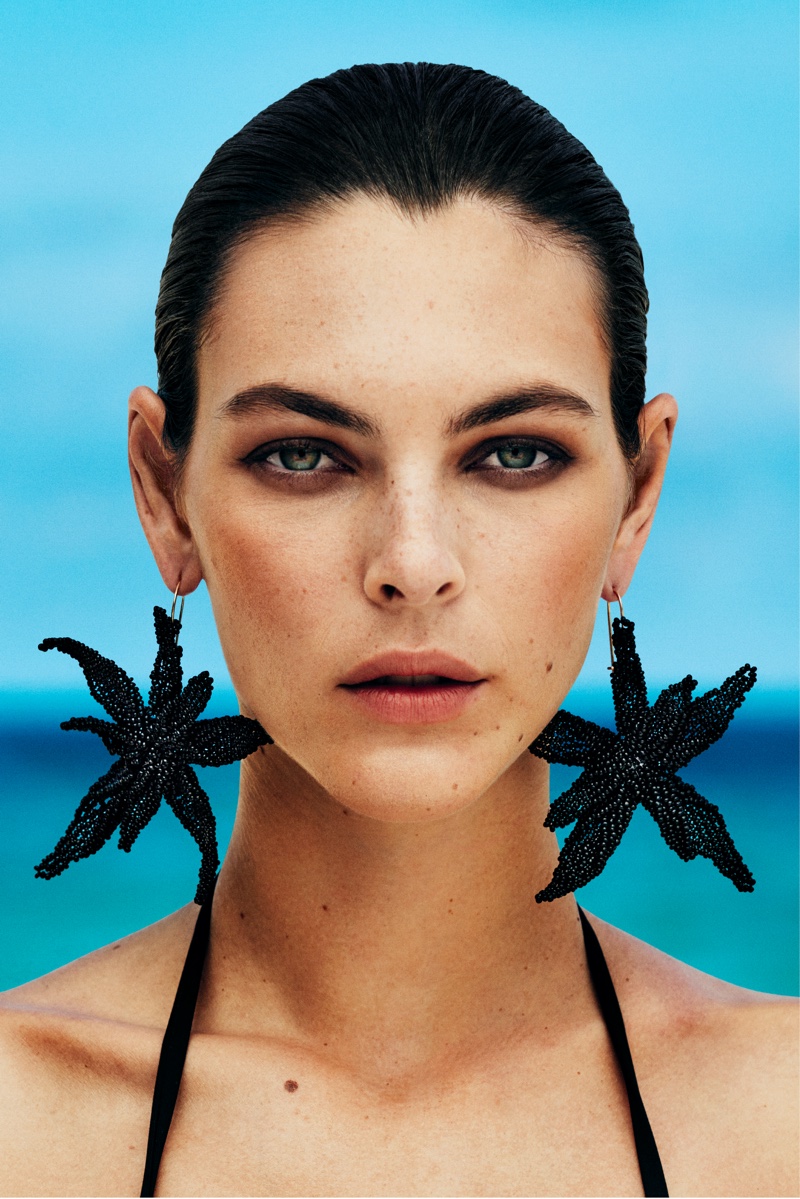 Vittoria Ceretti models statement earrings from H&M's summer 2024 collection.