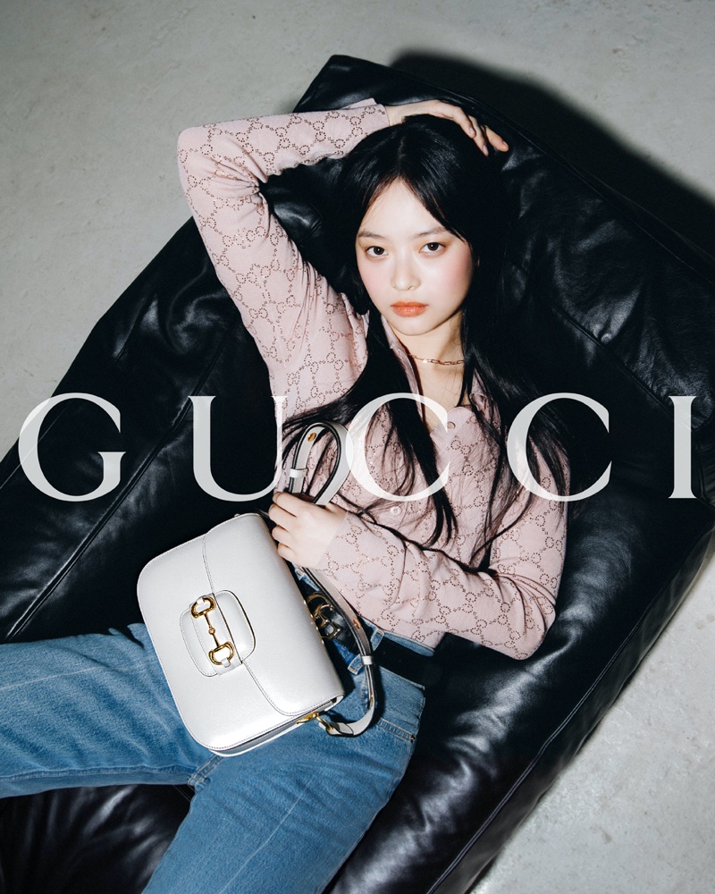 Gucci ambassador Hanni looks pretty in pink for the new Horsebit campaign.