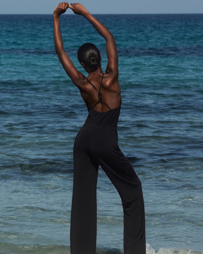 Max Mara offers a chic jumpsuit coverup for the spring-summer 2024 swimwear season.