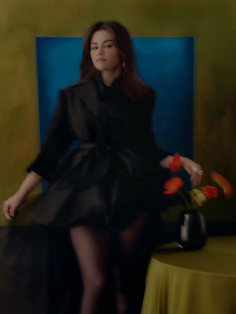 Dressed in a black look, Selena Gomez exudes elegance for the photoshoot.