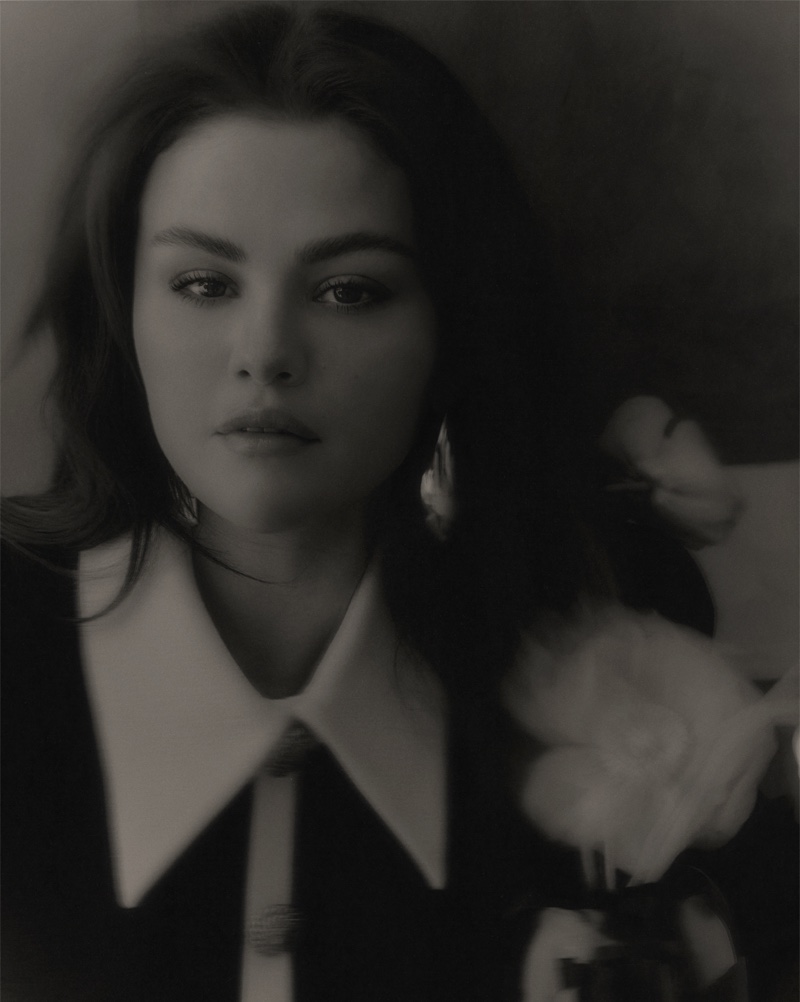 Captured in black and white, Selena Gomez wears a Balmain dress.