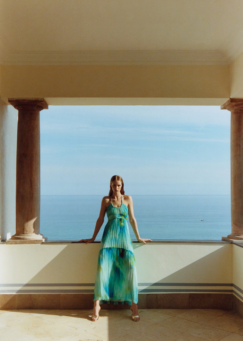 Mango showcases a vibrant, ocean-inspired maxi dress from its summer 2024 party dress edit.