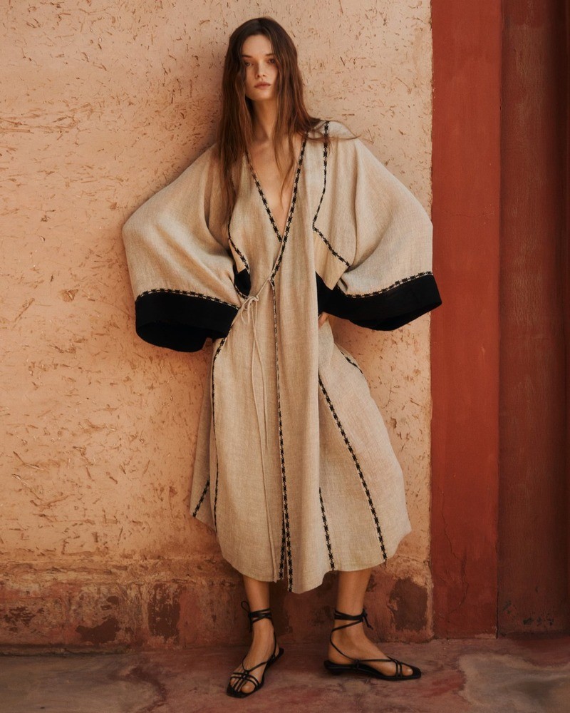 Massimo Dutti features a breezy kaftan dress in its Golden editorial for summer.