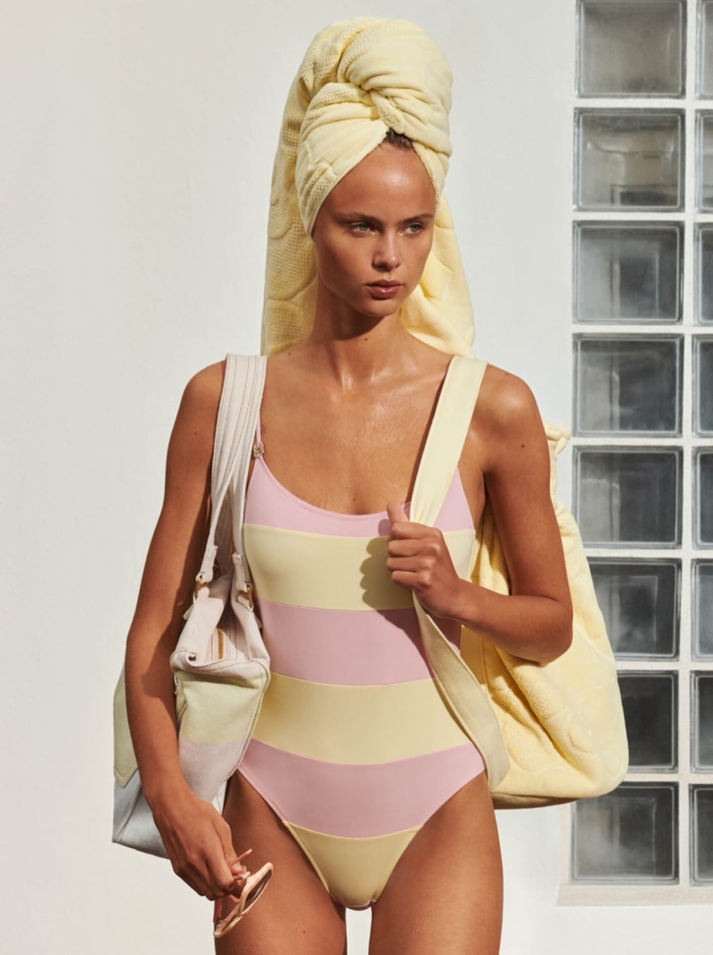 Chanel features a striped pastel swimsuit for its 2024 Coco Beach collection.