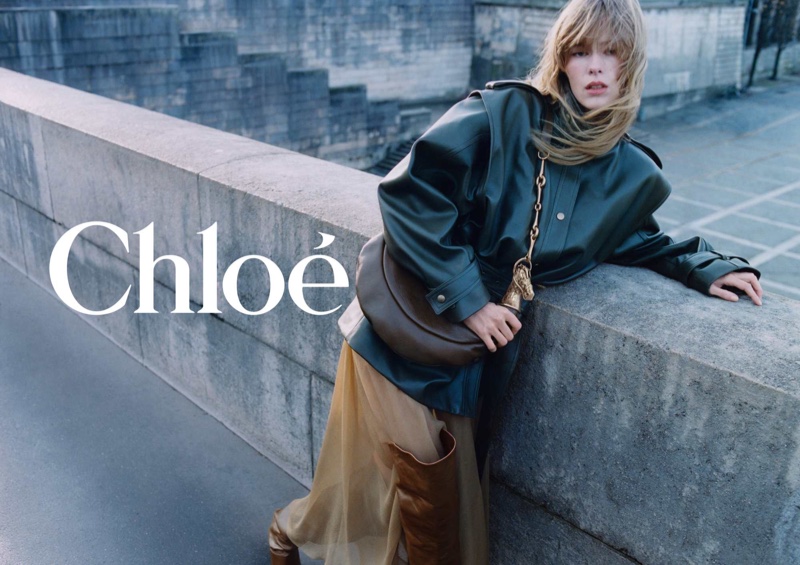 Kristine Lindseth layers up in a leather jacket and airy skirt for Chloé's fall 2024 campaign.