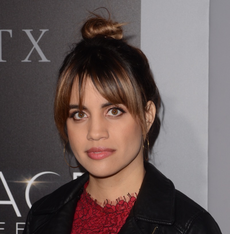 Natalie Morales top knot curtain bangs