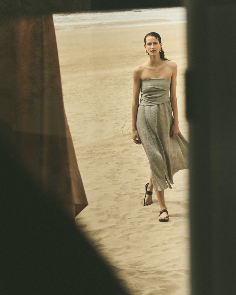 Massimo Dutti features a breezy, strapless dress for summer 2024.