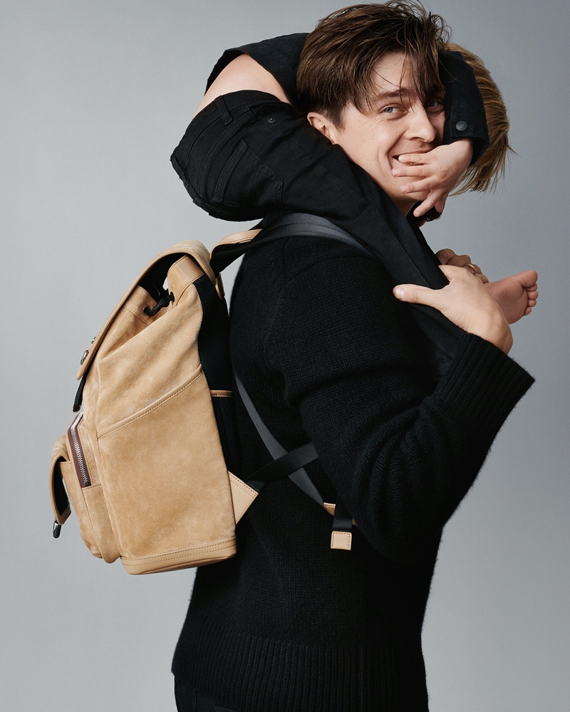 German soccer player Nicholas Krause poses with son Noah for Michael Kors' Father's Day campaign.