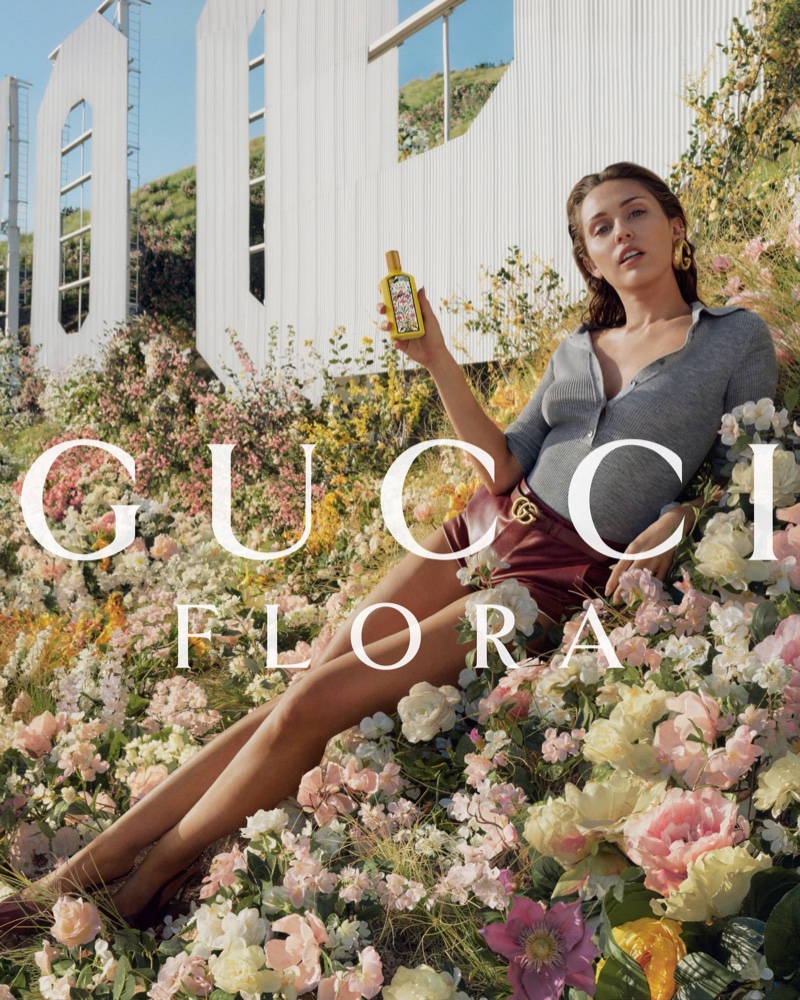 Posing at the Hollywood Sign, Miley Cyrus fronts Gucci's new Flora Gorgeous Orchid eau de parfum ad.