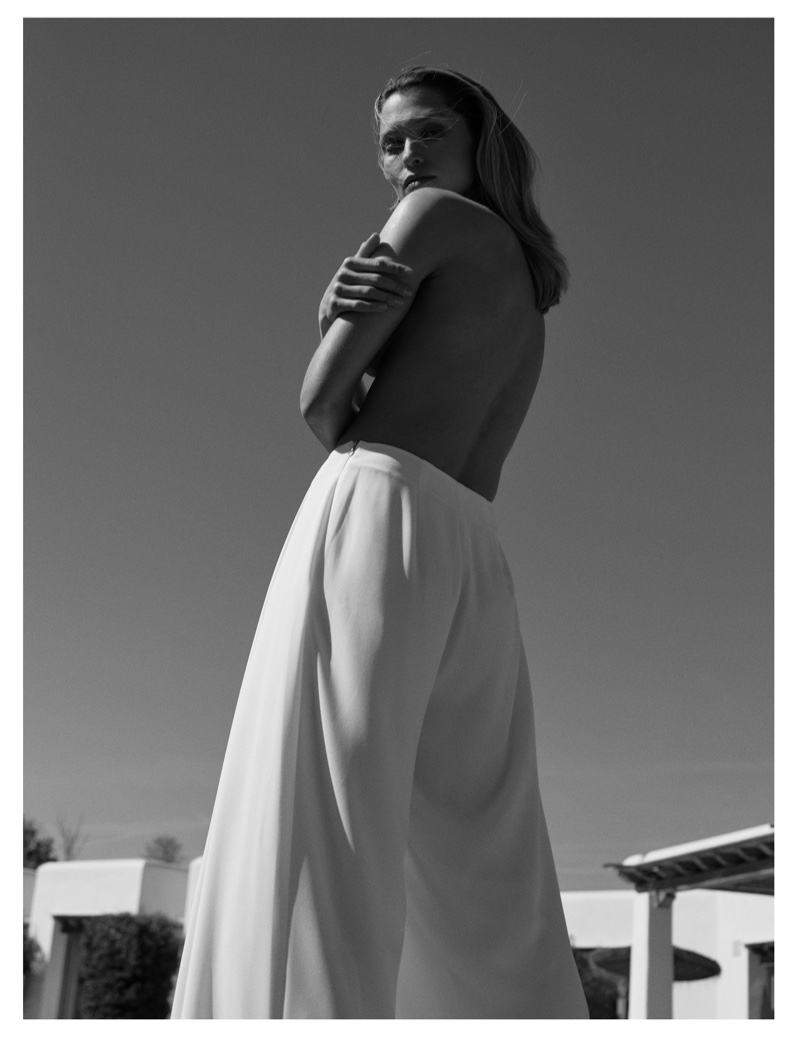 Showing wide-leg palazzo pants, Hana Jirickova fronts Peek & Cloppenburg's spring-summer 2024 ad,